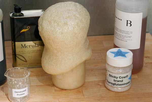 A beaker of expanding foam that overflowed and hardened down the sides