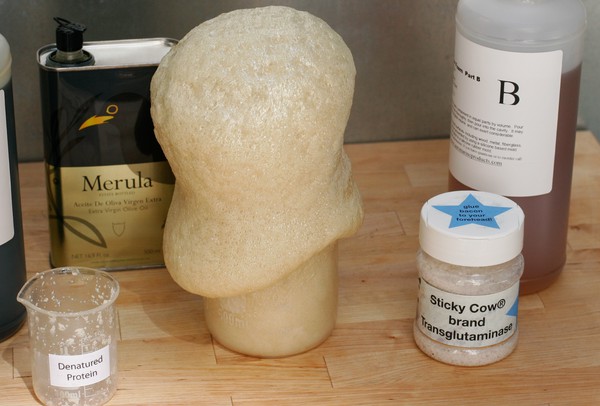 A beaker of expanding foam that overflowed and hardened down the sides